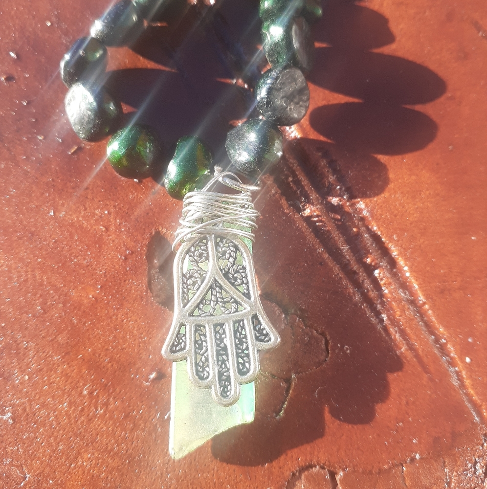 Green saltwater pearl necklace with green healing stone
